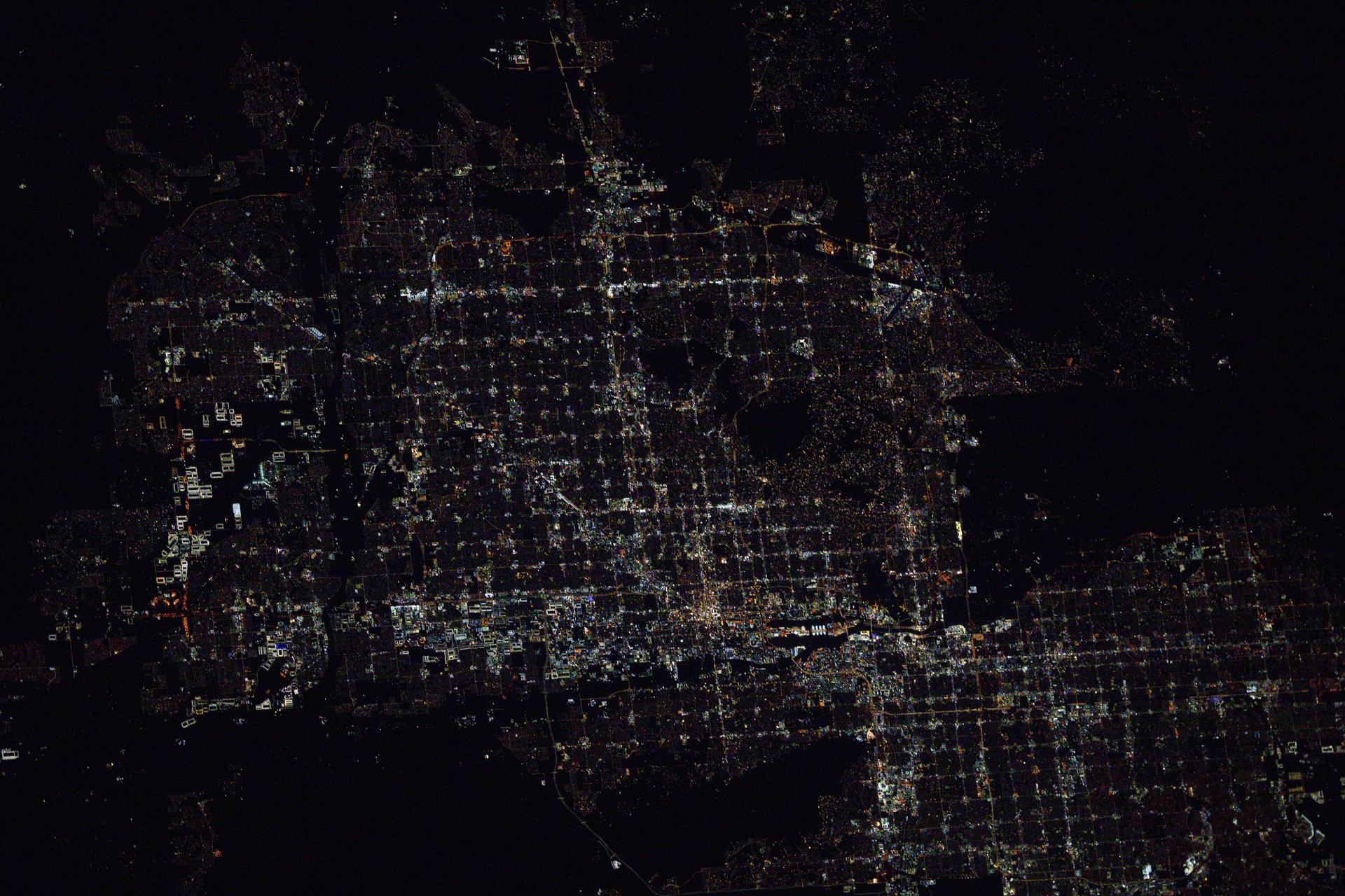 The metropolitan Phoenix, Arizona, area surrounded by suburbs such as Glendale, Scottsdale, and Tempe, is pictured at approximately 1:55 a.m. local time from the International Space Station as it orbited 260 miles above the Mexican state of Sonora near the U.S. border.