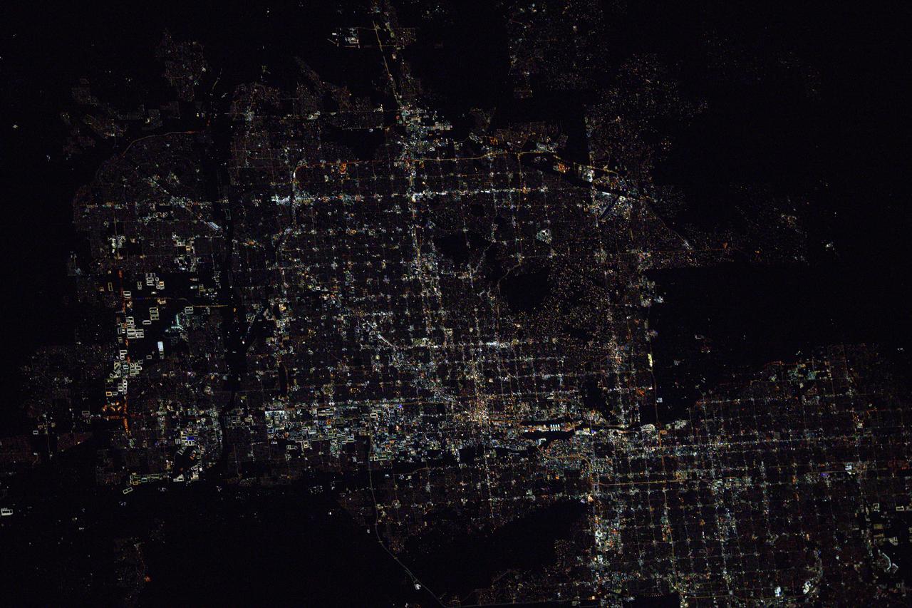 iss073e0075865 (May 16, 2025) --- The metropolitan Phoenix, Arizona, area surrounded by suburbs such as Glendale, Scottsdale, and Tempe, is pictured at approximately 1:55 a.m. local time from the International Space Station as it orbited 260 miles above the Mexican state of Sonora near the U.S. border.