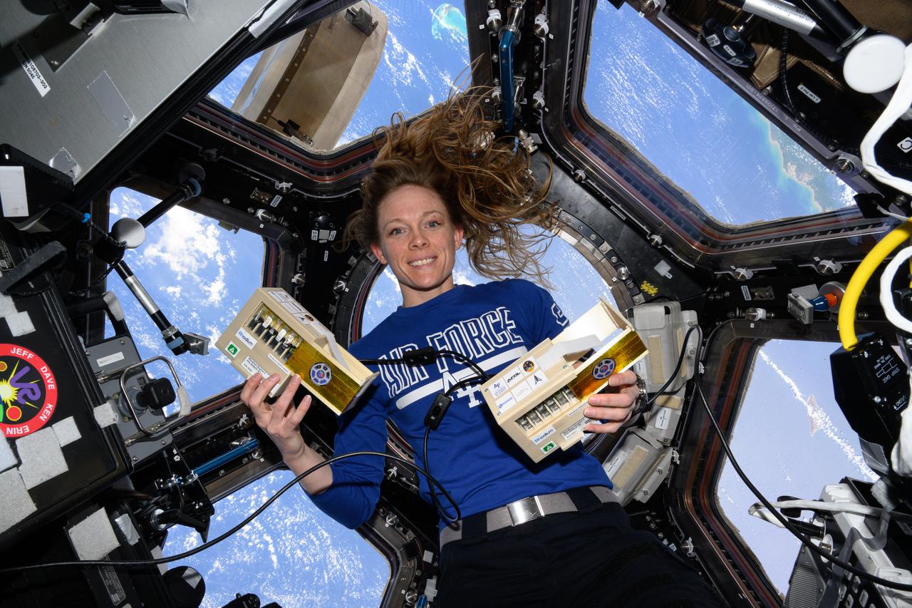 iss073e0076885 (5/21/2025) --- NASA astronaut Nichole Ayers is pictured inside the cupola with space botany hardware that supports the LEO Integrated Flori-culture Experiment (LIFE) 01 (Rhodium Plant LIFE) investigation. The investigation studies the affects of radiation and microgravity on plant growth to promote self-sustainable long-term human missions and increase crop production on Earth.