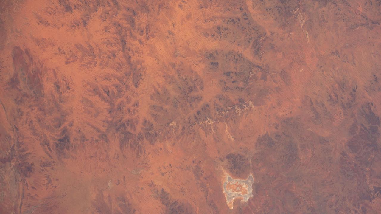 iss073e0078403 (May 23, 2025) --- The sparsely populated, hot desert region of Western Australia near Neale Junction Nature Reserve is pictured from the International Space Station as it orbited 265 miles above the continental nation.