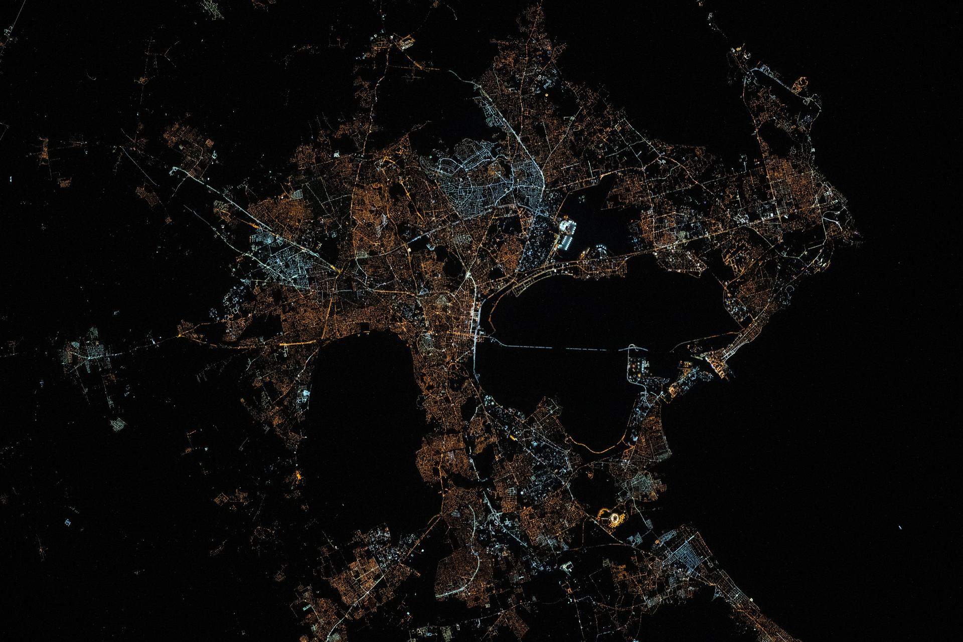 The city lights of Tunis, the capital of the north African nation of Tunisia with a metropolitan population of 2.67 million, contrast the city's historical and modern character in this photograph at approximately 12:34 a.m. local time from the International Space Station as it orbited 260 miles above the Mediterranean Sea. Tunis sits in between the Lake of Tunis and the Sebkhet Sejoumi, a seasonal salt flat, and is situated on the Gulf of Tunis.