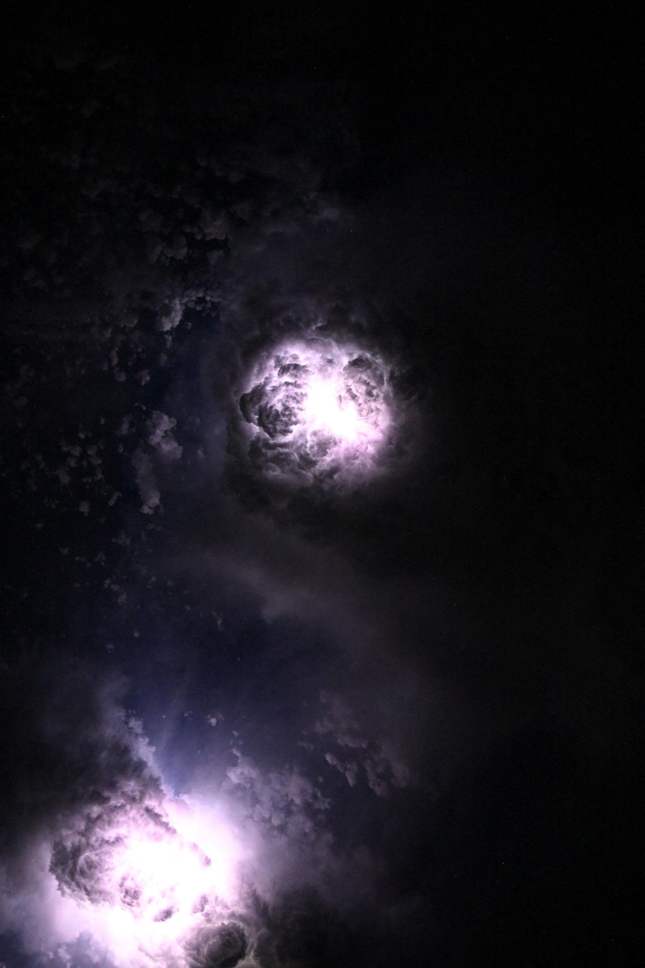 This nebula-like formation is actually lightning illuminating the clouds during a storm off the coast of North Carolina in this photograph from the International Space Station as it orbited 260 miles above the Atlantic Ocean.