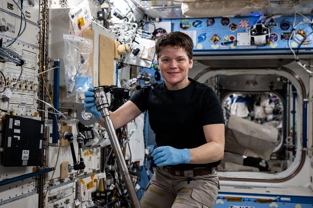 NASA image: Astronaut Anne McClain assembles research hardware inside Kibo laboratory module