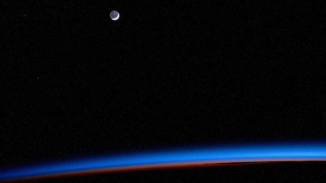 iss073e0118626 (May 25, 2025) --- An external high definition camera adjusted for night sensitivity took this photograph of the waning crescent Moon above Earth's horizon as the International Space Station orbited into a sunrise 270 miles above the Atlantic Ocean.