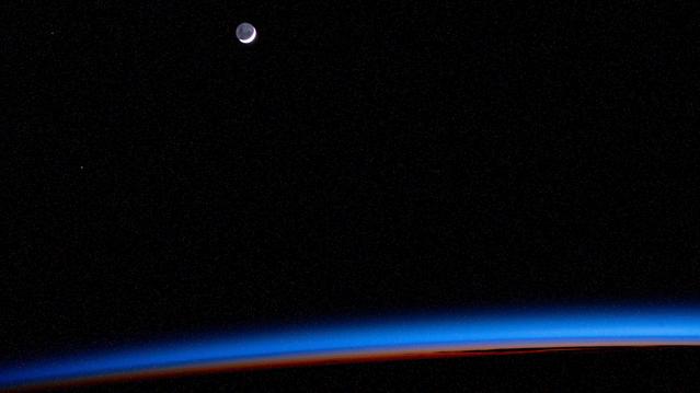 NASA image: The waning crescent Moon above Earth's horizon