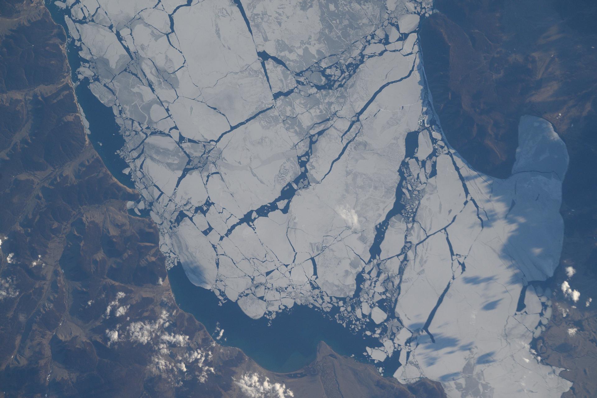 The ice-covered Khuvsgul Lake in northern Mongolia near the Russian border is pictured from the International Space Station as it orbited 263 miles above the Asian continent.