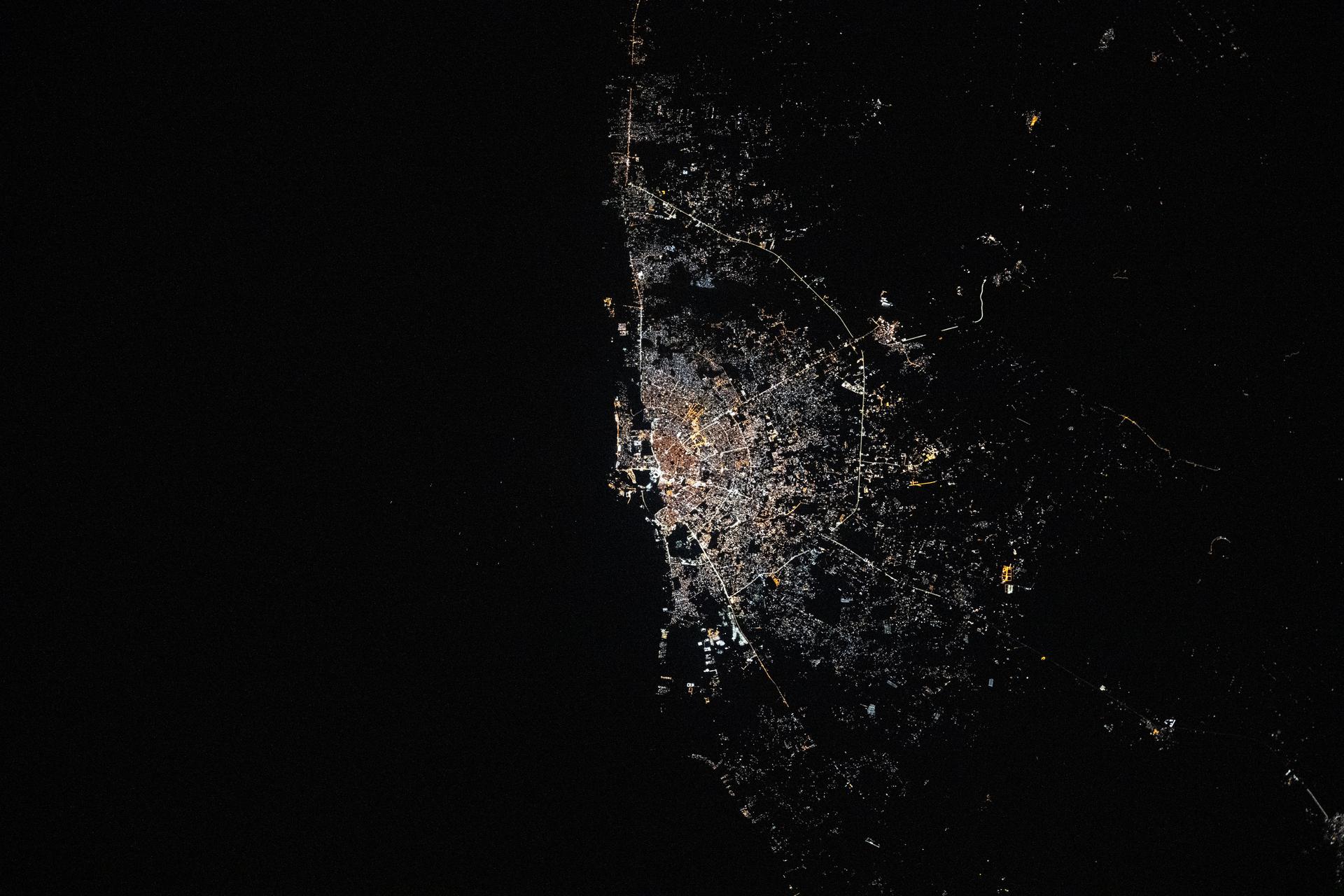 Benghazi, Libya, the north African nation's second most-populous city on the Mediterranean coast with a population of about 859,000, is pictured at approximately 12:49 a.m. local time from the International Space Station as it orbited 260 miles above.