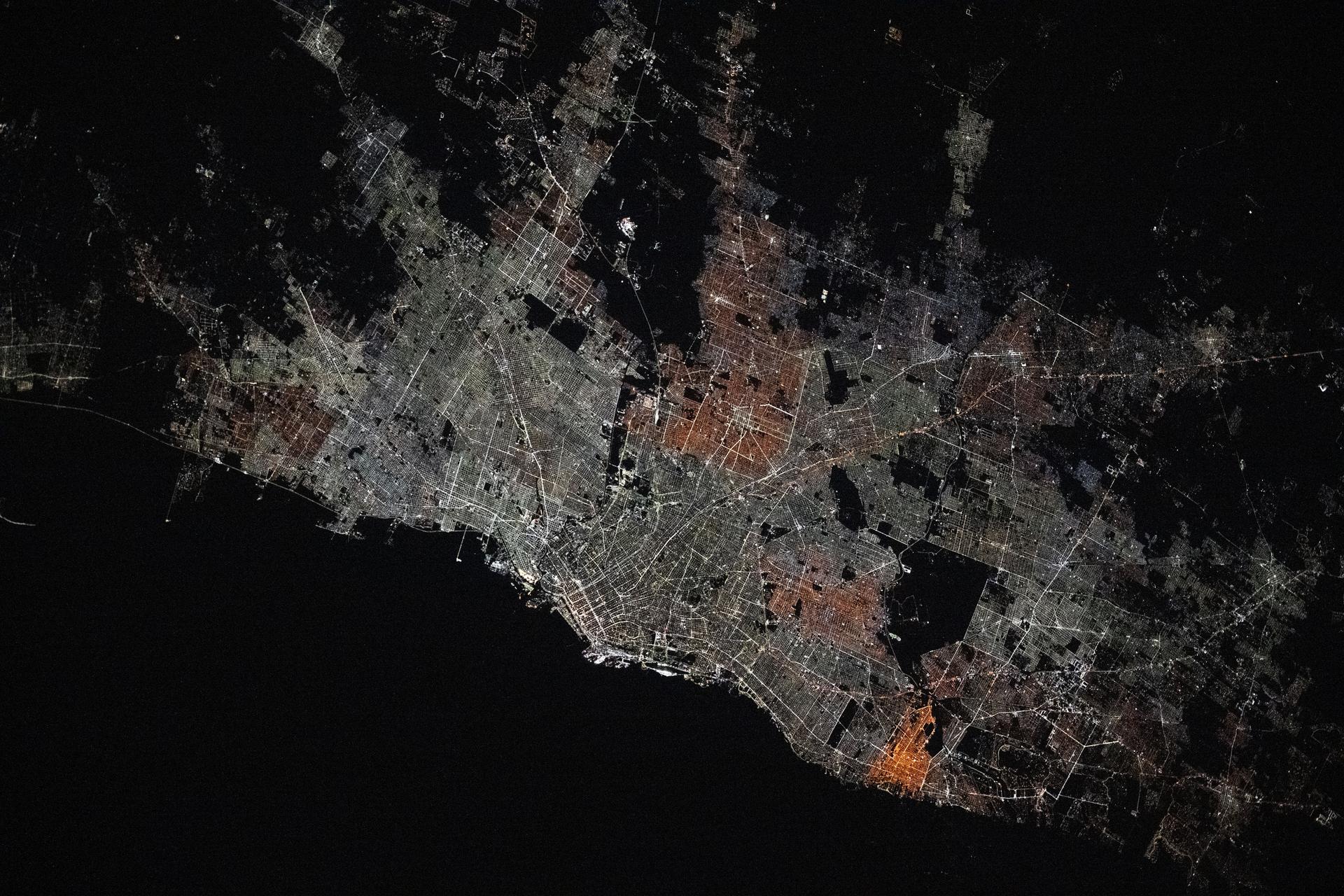Buenos Aires, Argentina, the South American nation's largest city with a population of about 3.12 million, surrounded by numerous suburbs on the bank of the Rio de la Plata is pictured at approximately 4:43 a.m. local time from the International Space Station as it orbited 267 miles above.