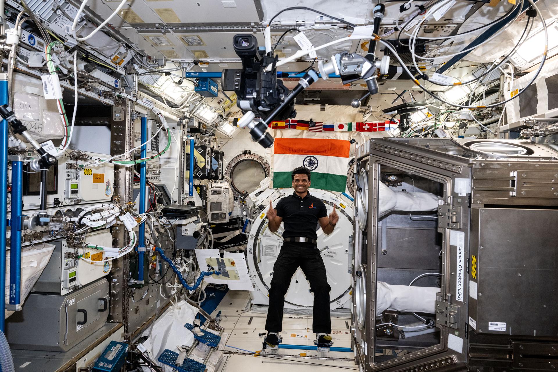 ISRO (Indian Space Research Organisation) astronaut and Axiom Mission 4 Mission Specialist Shubhanshu Shukla poses for a portrait aboard the International Space Station's Kibo laboratory module during a space-to-ground conference with Prime Minister of India Narendra Modi.