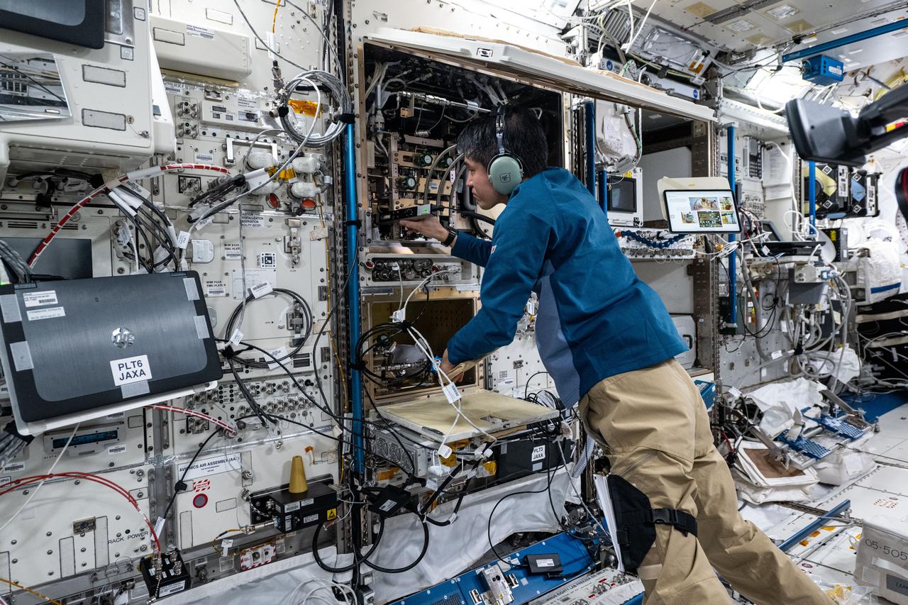 iss073e0379658 (July 16, 2025) --- JAXA (Japan Aerospace Exploration Agency) astronaut and Expedition 73 Commander Takuya Onishi works inside the International Space Station's Kibo laboratory module troubleshooting and inspecting combustion research hardware in the Multipurpose Small Payload Rack.