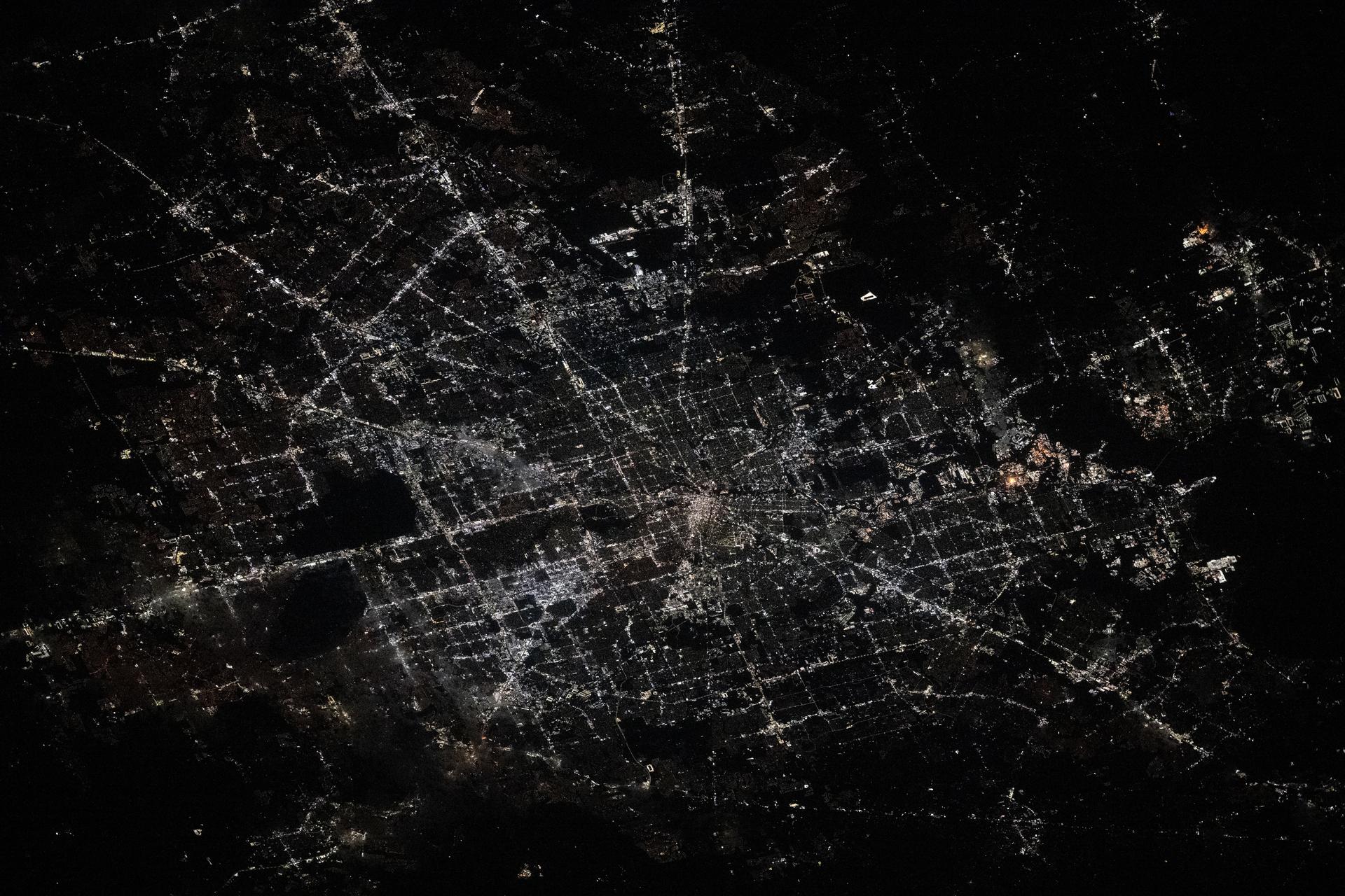 Houston, Texas, the Lone Star State's largest city with a metropolitan population of about 7.12 million, is pictured at approximately 2:52 a.m. local time from the International Space Station as it orbited 260 miles above. Houston is ringed by three main beltways including the innermost I-610, followed by the Sam Houston Tollway, and the outermost Grand Parkway which will be the longest beltway in the U.S. upon completion.