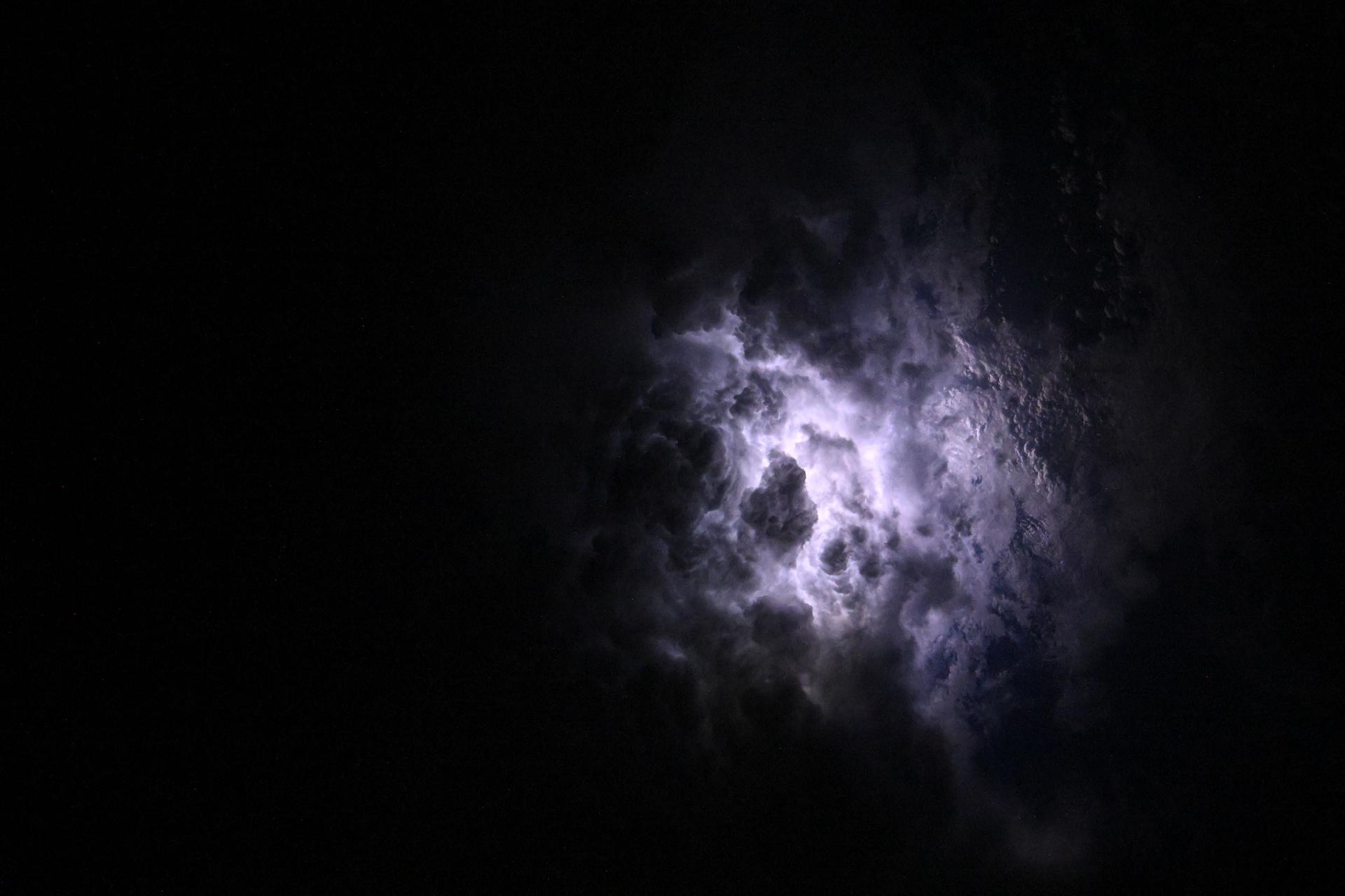 Lightning illuminates the cloud tops of Category 1 Hurricane Erick as it stormed across the Pacific Ocean south of the Mexican state of Chiapas at approximately 3:42 a.m. local time as the International Space Station orbited 258 miles above.