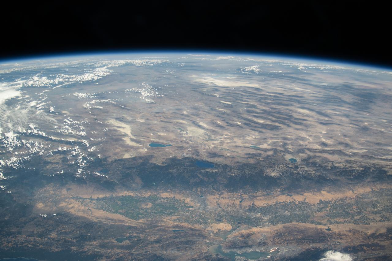 iss073e0420556 (Aug. 3, 2025) --- From bottom to top, or from west to east in this orientation, California's Central Valley extends across the bottom of this photograph and just above the San Francisco Bay Area. Past the Central Valley is the Sierra Nevada mountain range that leads into Nevada's Great Basin region and eastward toward the Rocky Mountains. The International Space Station was soaring 260 miles above the Pacific Ocean at the time of this photograph.