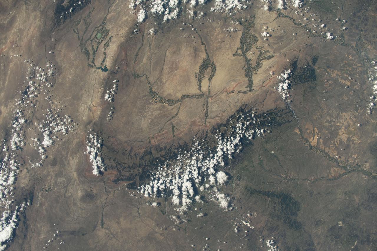 iss073e0420598 (Aug. 3, 2025) --- Bighorn National Forest in Wyoming and Custer National Forest in Montana, located in the Rocky Mountains region of the United States, are pictured from the International Space Station as it orbited 261 miles above.