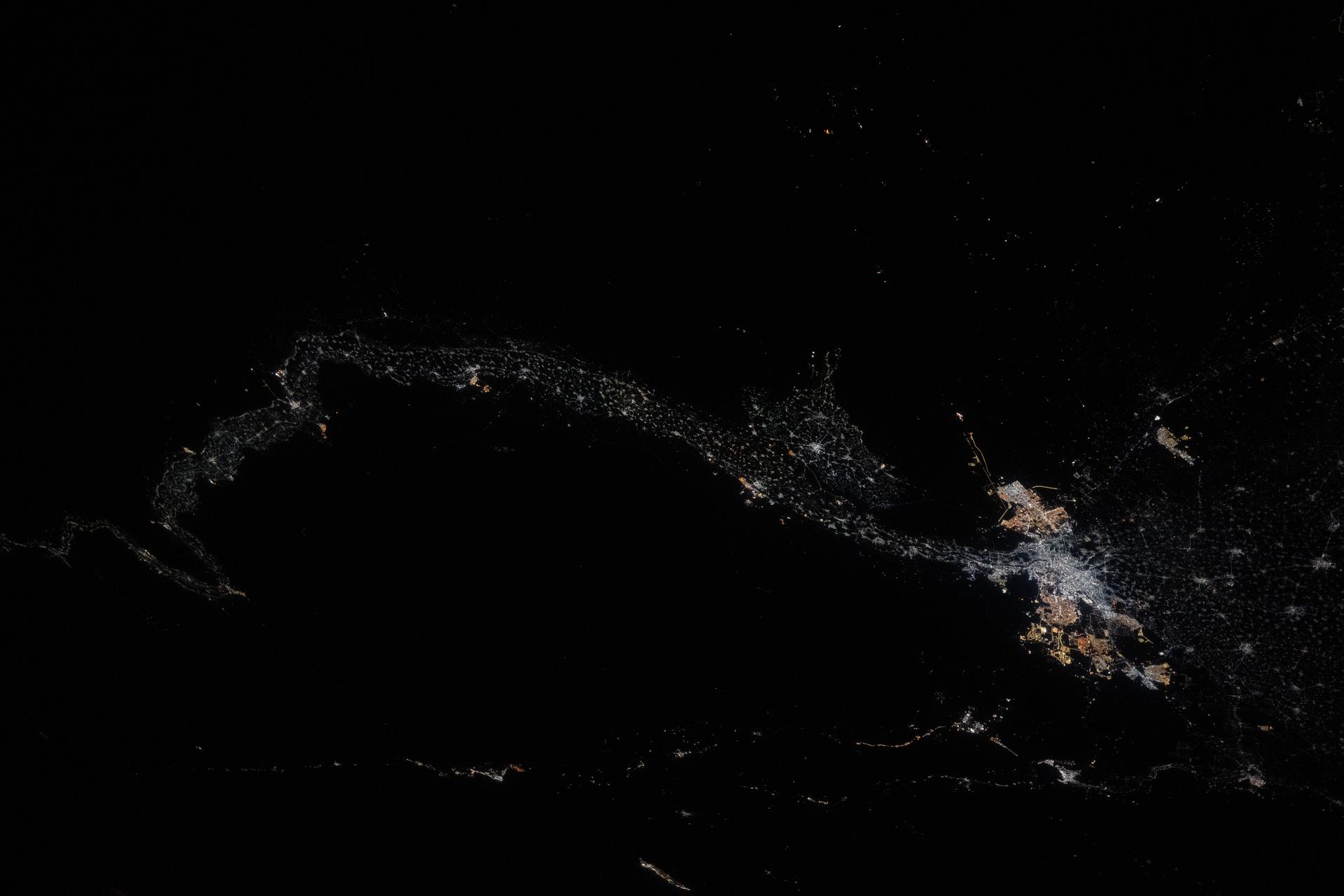 Egypt’s Nile River stretches from Luxor—home to the ancient Valley of the Kings—at the far left of this nighttime view from the International Space Station, all the way to the sprawling metropolitan area of Cairo at the base of the Nile Delta. This photograph was taken at approximately 1:30 a.m. local time while the station was orbiting 259 miles above Earth.
