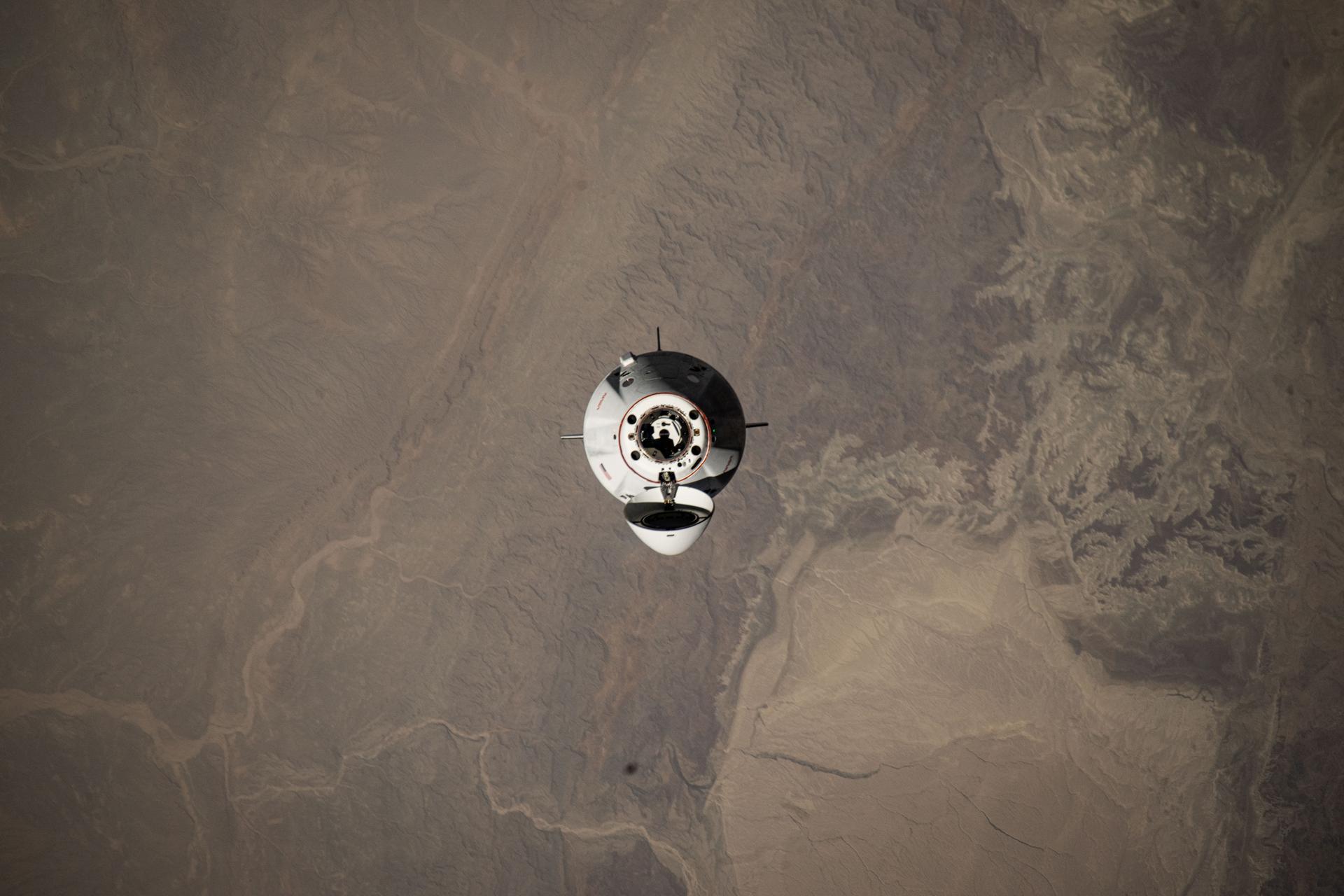 The SpaceX Dragon spacecraft carrying four members of NASA's SpaceX Crew-11 mission is pictured approaching the International Space Station 259 miles above central Pakistan.