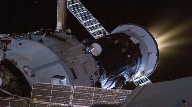  The Progress 91 resupply ship fires its thrusters to reboost the International Space Station