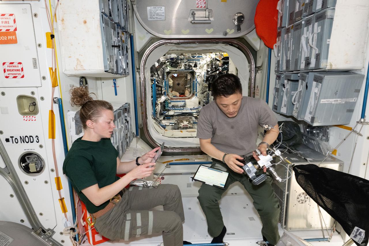 iss073e0505793 (Aug. 9, 2025) --- NASA astronauts Zena Cardman and Jonny Kim, both Expedition 73 Flight Engineers, are pictured inside the International Space Station's Unity module during weekend housecleaning and maintenance activities. Kim and Cardman are both part of NASA Astronaut Group 22 selected in June 2017 with 12 other astronauts, including two Canadian Space Agency astronauts, and affectionately nicknamed "The Turtles."