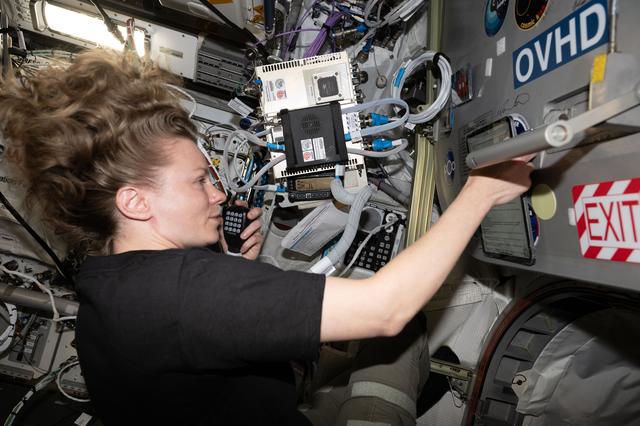 NASA image: NASA astronaut Zena Cardman speaks on a ham radio with the NixderStelar youth organization