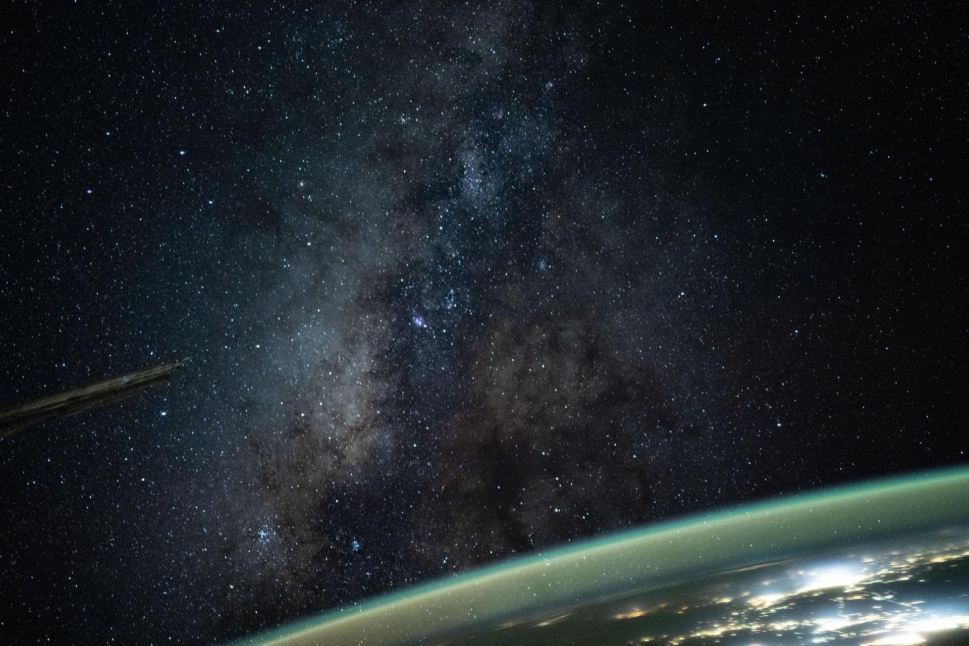 The Milky Way appears above Earth's bright atmospheric glow in this photograph from the International Space Station as it soared 261 miles above southern Iran at approximately 12:54 a.m. local time. The camera was configured for low light and long duration settings.