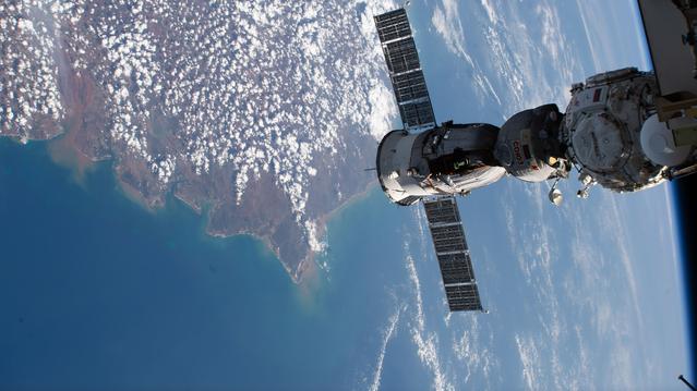 NASA image: The Soyuz MS-27 spacecraft docked to the Prichal module above Madagascar