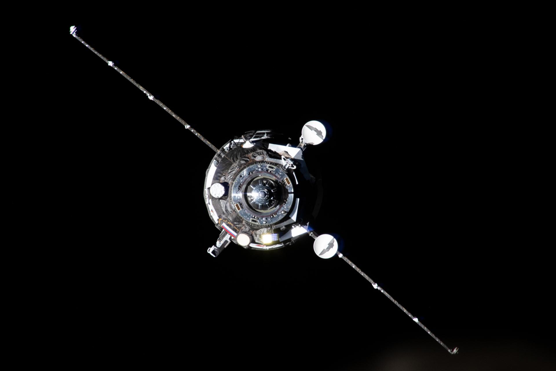 The Progress 93 resupply ship from Roscosmos, carrying about three tons of food, fuel, and supplies for the Expedition 73 crew, is pictured automatically approaching the International Space Station before docking to the Zvezda service module's rear port for six months of cargo activities.
