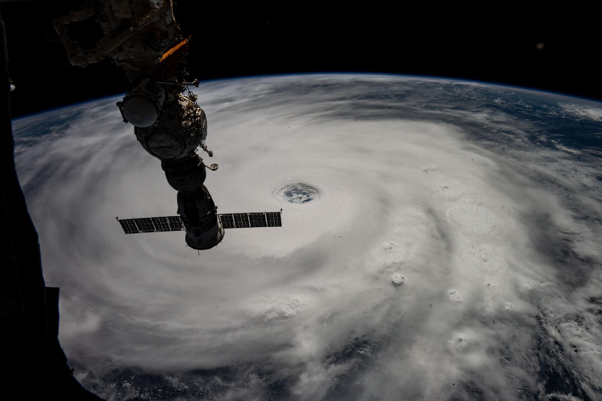 Typhoon Ragasa with its well-defined eye is pictured southeast of Taiwan in the Philippine Sea from the International Space Station as it orbited 257 miles above. Silhouetted in the foreground, is the Soyuz MS-27 spacecraft docked to the Prichal module.