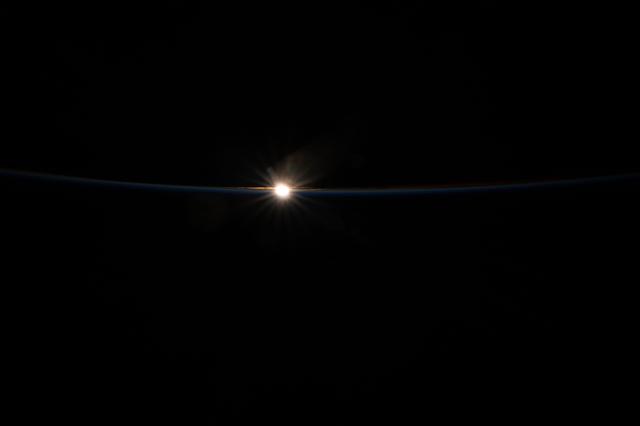 NASA image: The last rays of an orbital sunset fade above Earth’s horizon
