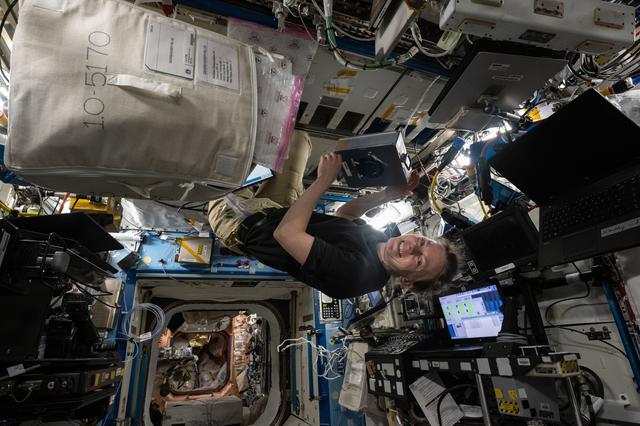 NASA image: NASA astronaut Zena Cardman conducting research operations for a biotechnology experiment
