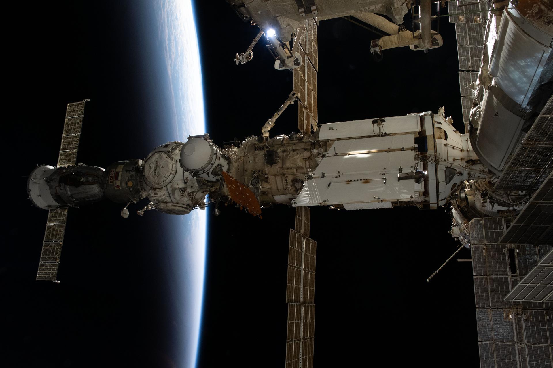 This view of the International Space Station’s Roscosmos segment shows (from left) the Soyuz MS-27 crew spacecraft docked to the Prichal module. Prichal is connected to the Nauka science module, which in turn is attached to the Earth-facing port of the Zvezda service module. At the time of this photograph, the orbital complex was soaring into a sunset 270 miles above the Indian Ocean, between South Africa and Antarctica, at approximately 8:22 p.m. local time.