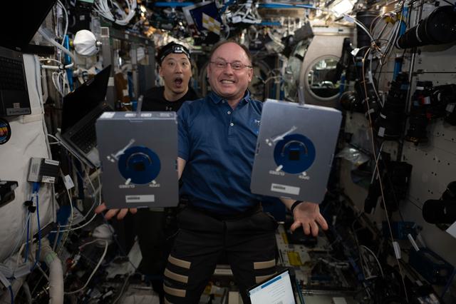 NASA image: NASA astronauts Jonny Kim and Mike Fincke pose for a fun portrait during research activities