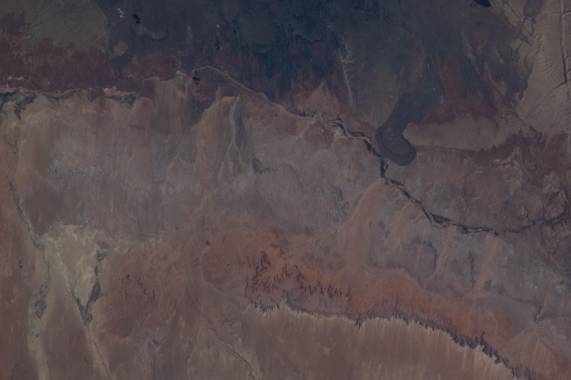 Arizona's Wupatki National Monument—rich in Native American archaeology, shaped by desert landscapes and ancient volcanic activity—is pictured from the International Space Station as it orbited 262 miles above the southwestern edge of the Colorado Plateau.