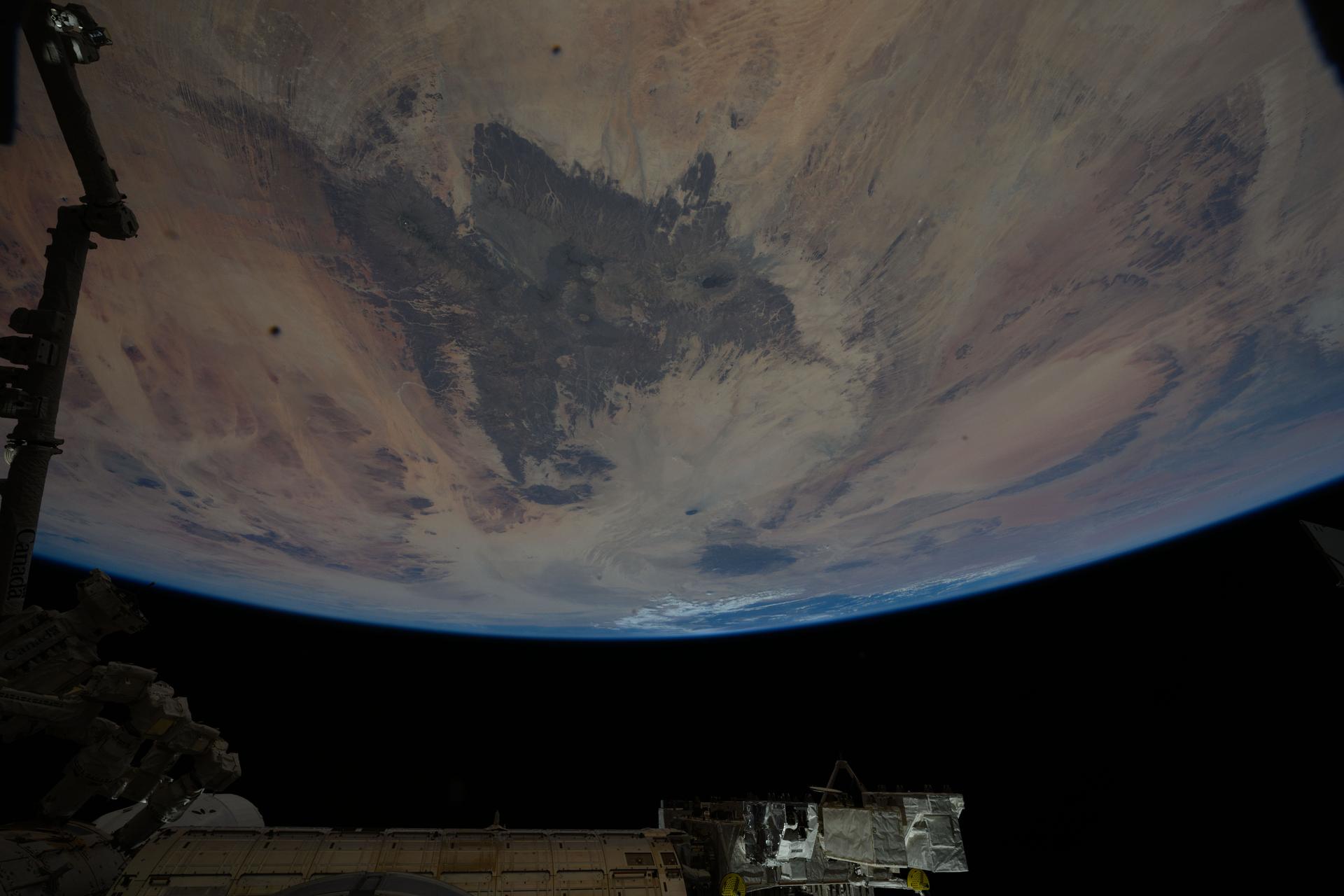 The Tibesti Mountains in the Sahara, primarily formed by volcanic activity between 34 and 23 million years ago and located mostly in northern Chad, are pictured from the International Space Station as it orbited 260 miles above the African continent.