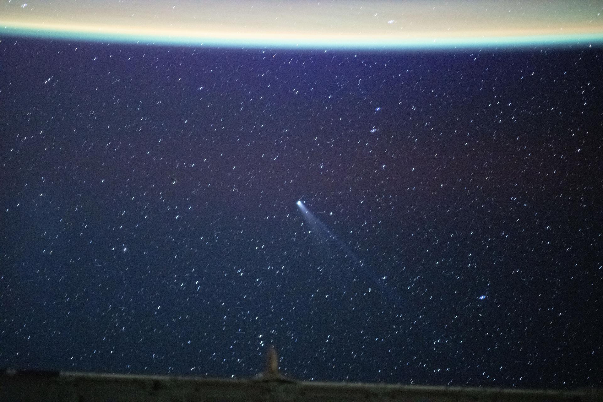 Comet Lemmon (C/2025 A6) appears approximately 55.4 million miles (89.2 million kilometers) from Earth in this long-exposure photograph taken from the International Space Station. The star trails in the background result from the camera’s extended shutter speed.