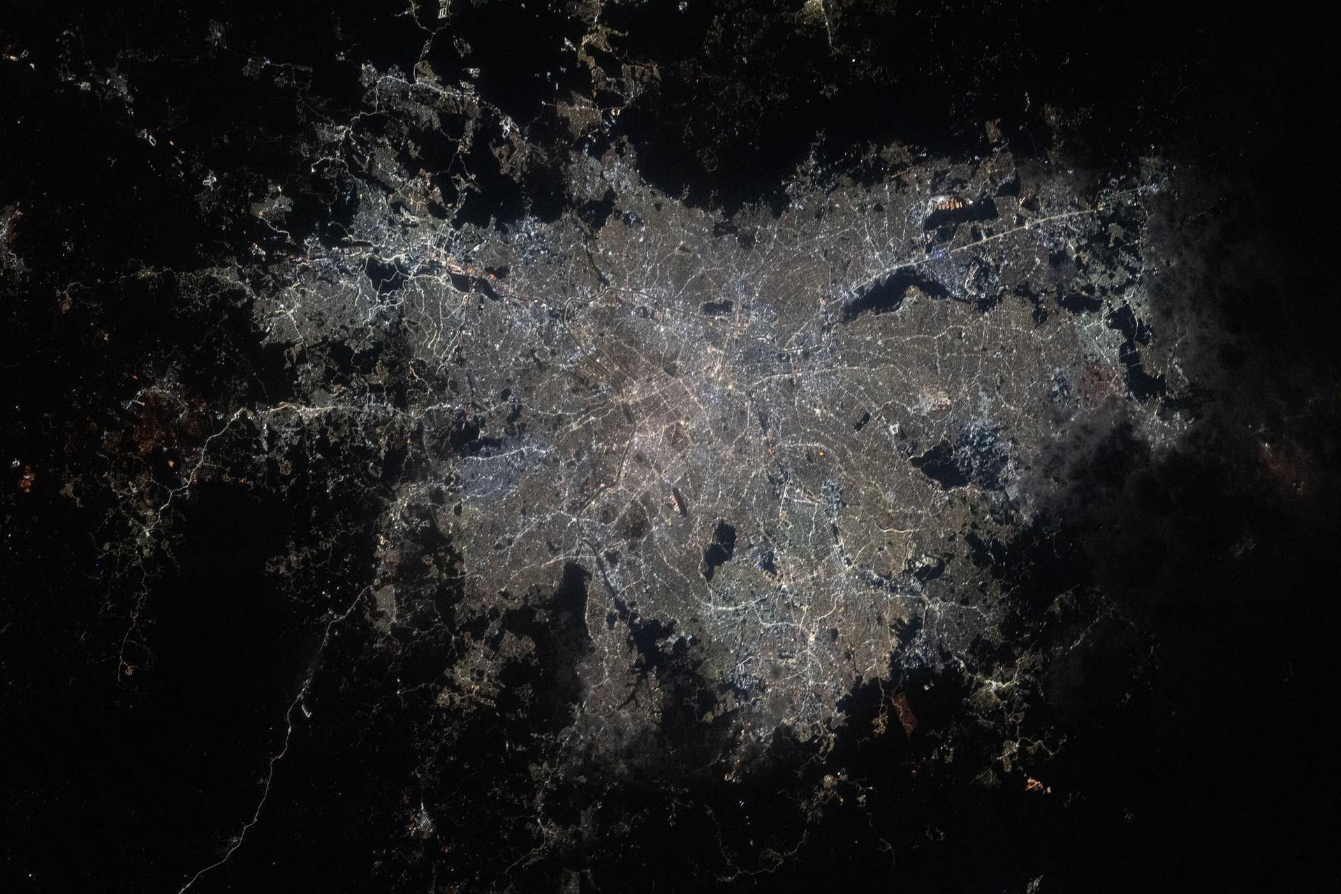 São Paulo, Brazil—with a metropolitan population of about 23 million—is the fifth most populous region in the world. As Brazil's economic powerhouse, São Paulo hosts one of the largest stock exchanges in the world and leads in the automotive, aerospace, and pharmaceutical industries. The city's brighter, more energy-efficient white LED lights reflect the region’s ongoing progress and modernization of its infrastructure. This photograph was taken from the International Space Station as it orbited 264 miles above the Brazilian coast at approximately 2:20 a.m. local time.