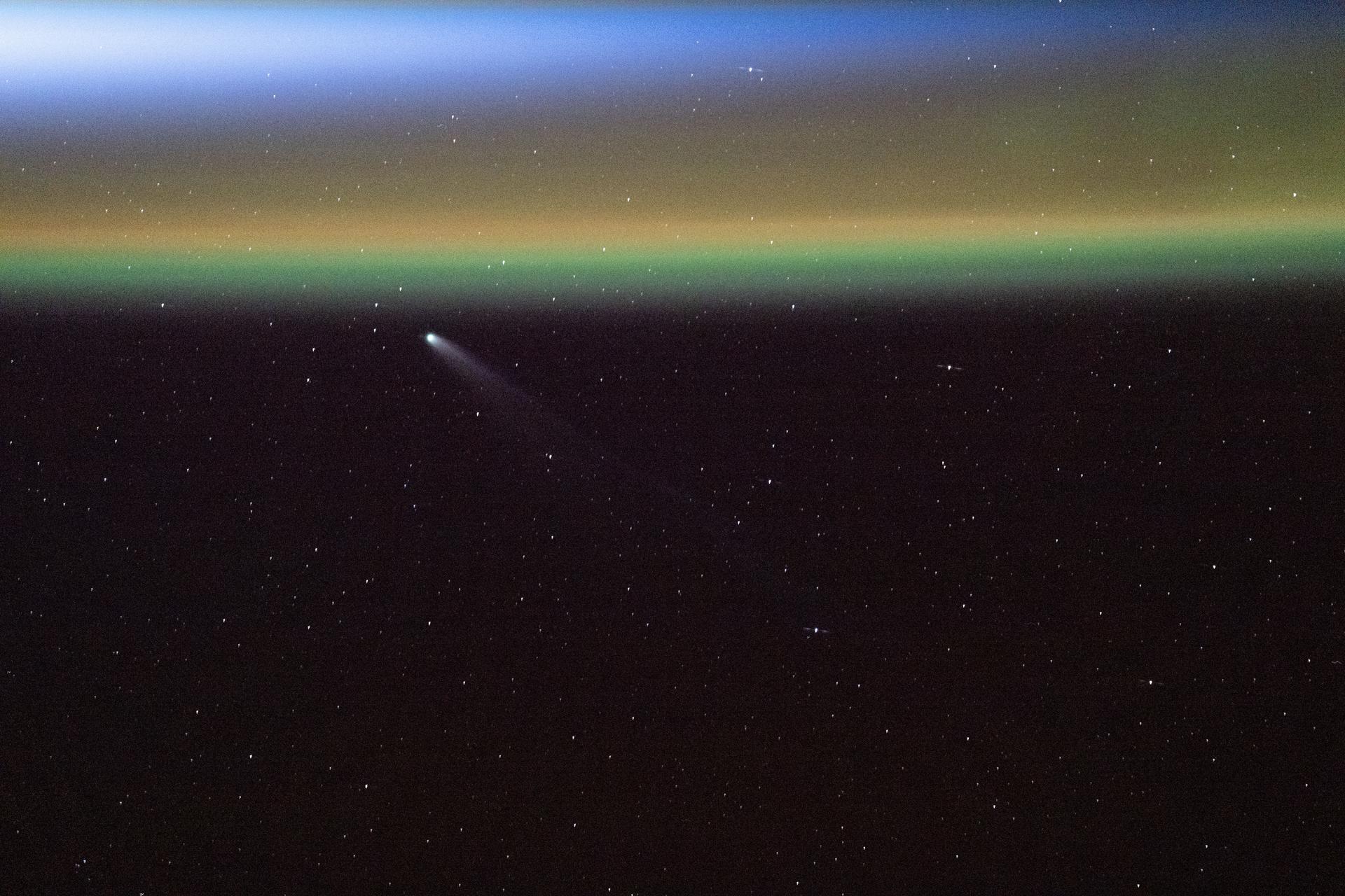 Comet Swan (C/2025 R2) appears above Earth’s yellow-green airglow just before an orbital sunrise, at a distance of about 27.2 million miles (43.8 million kilometers) from the planet. The International Space Station was orbiting 264 miles above the Atlantic Ocean off the coast of Canada's most easterly province of Newfoundland and Labrador when this photograph was taken.