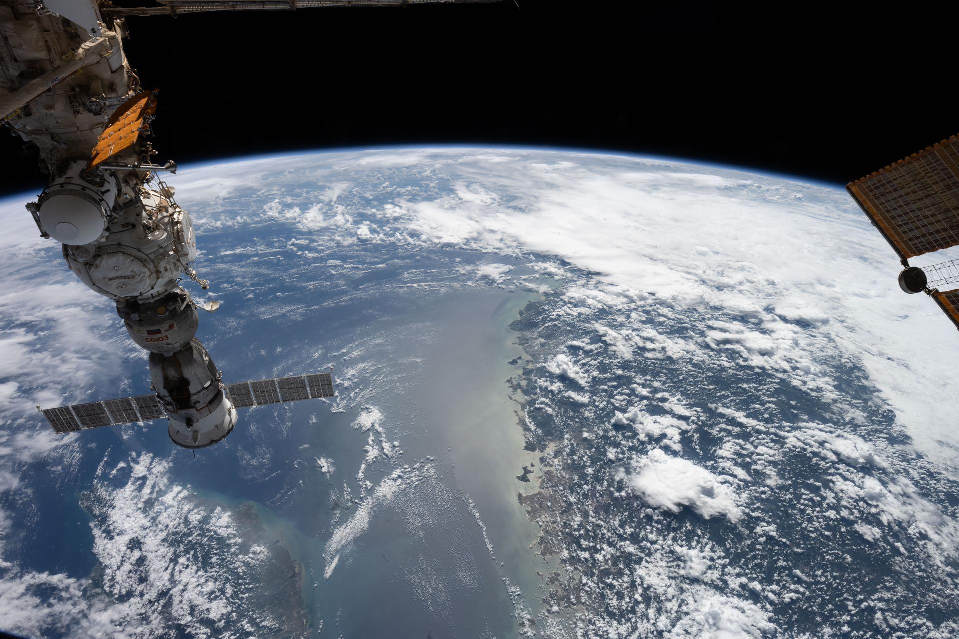 The Taiwan Strait separates the eastern coast of China’s Fujian Province (right) from the island nation of Taiwan (lower left) in this photograph taken from the International Space Station as it orbited 257 miles above Earth. The strait is a vital waterway in East Asia, supporting the fishing, shipping, and communications industries.