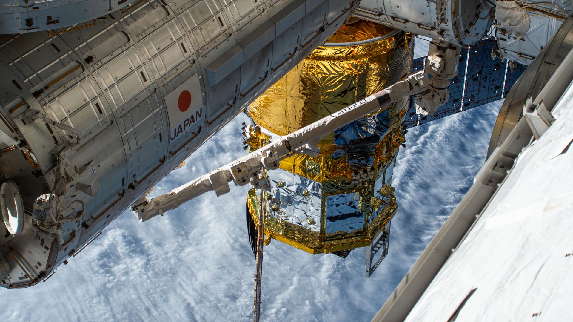 The new HTV-X1 cargo spacecraft from JAXA (Japan Aerospace Exploration Agency) is pictured berthed to the Earth-facing port on the International Space Station’s Harmony module. Crossing the left side of the photograph is JAXA’s Kibo laboratory module, attached to Harmony's port side. Kibo is a microgravity research facility that enables crews to conduct advanced space experiments in biology, physics, technology, and more.