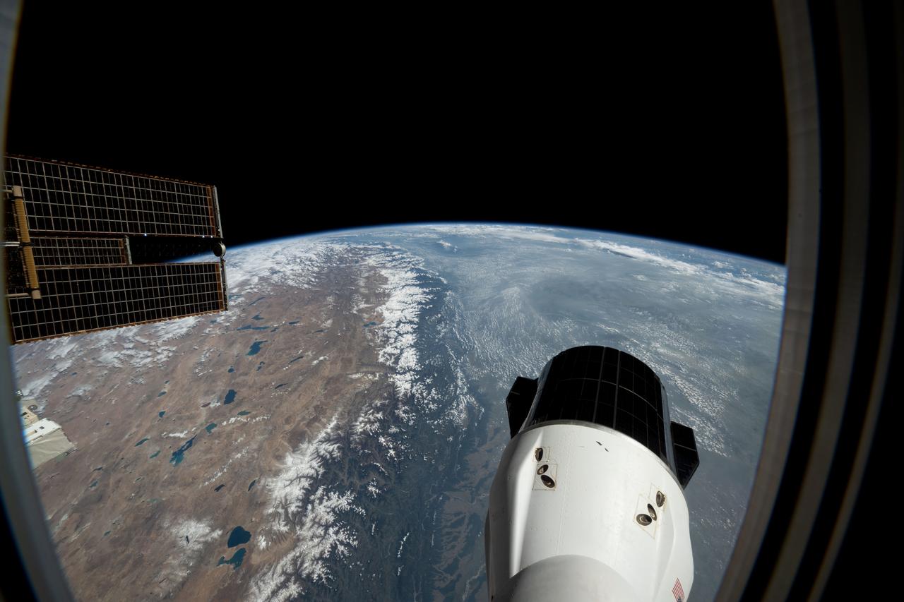 iss073e1025732 (Oct. 18, 2025) --- The Himalayas separate mainland Asia from the Indian subcontinent, revealing an arid, desert-like terrain on the Asian side, known as the Tibetan Plateau. On the southern slopes of the mountain range, moist air rises, cools, and condenses, producing rainfall that supports a humid, subtropical climate. As the air descends on the northern slopes, it warms and dries, creating barren conditions due to the rain shadow effect. This photograph was taken from a window aboard the SpaceX Dragon crew spacecraft as the International Space Station orbited 263 miles above India.