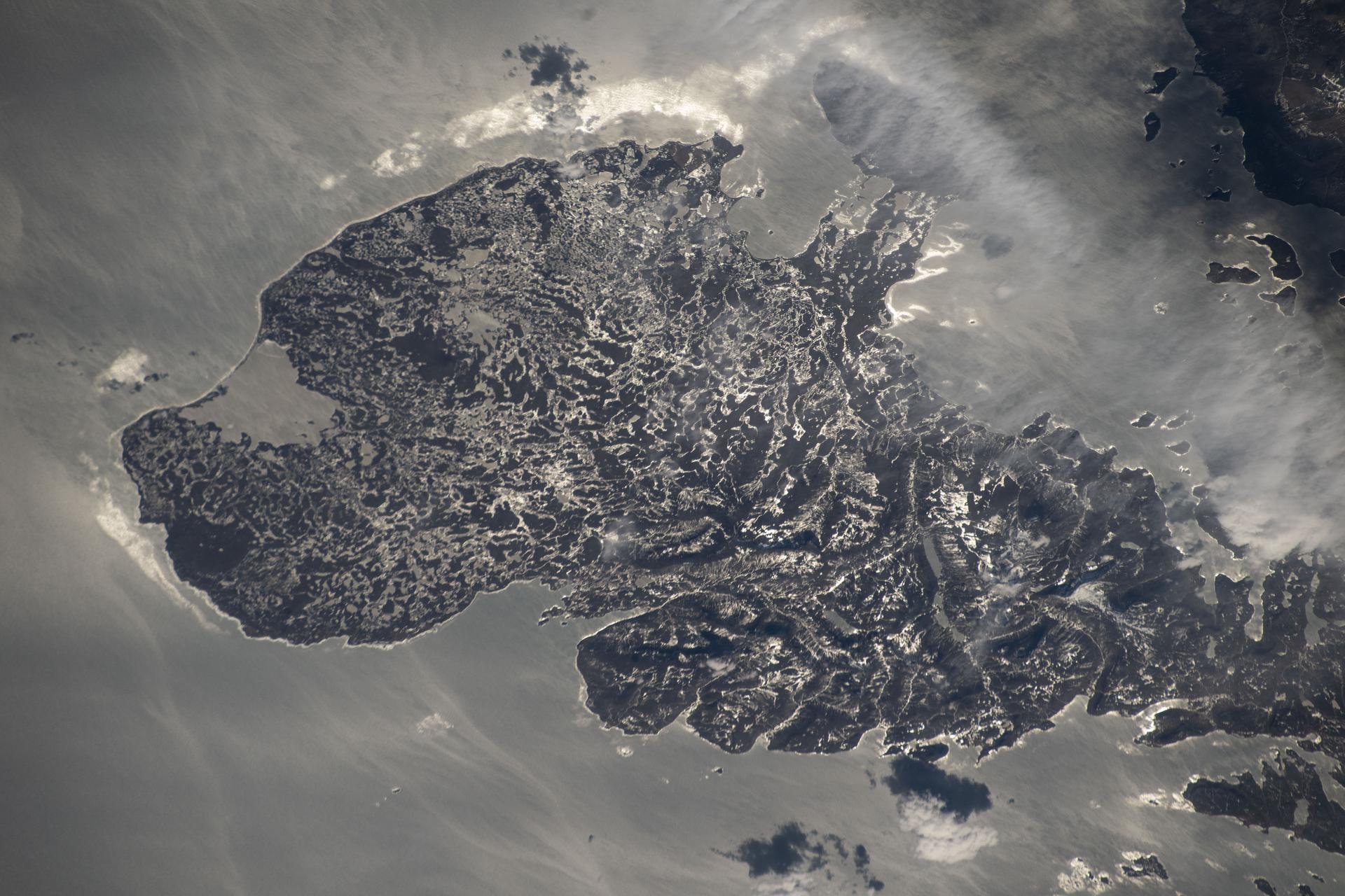 iss073e1047970 (Nov. 2, 2025) --- The western portion of Grand Terre, part of the French Southern and Antarctic Lands, is pictured from the International Space Station as it orbited 270 miles above the Indian Ocean. The largest island in the Kerguelen Archipelago, this UNESCO World Heritage Site is of volcanic origin, features a cold oceanic climate, and is home to king penguins, elephant seals, and albatrosses.