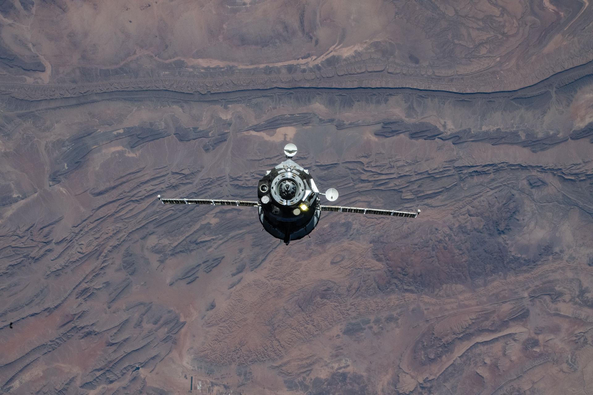 The Soyuz MS-28 crew spacecraft carrying NASA astronaut Chris Williams and Roscosmos cosmonauts Sergey Kud-Sverchkov and Sergei Mikaev approaches the International Space Station. Both spacecraft were orbiting 263 miles above the mountainous region in southern Morocco at the time of this photograph.