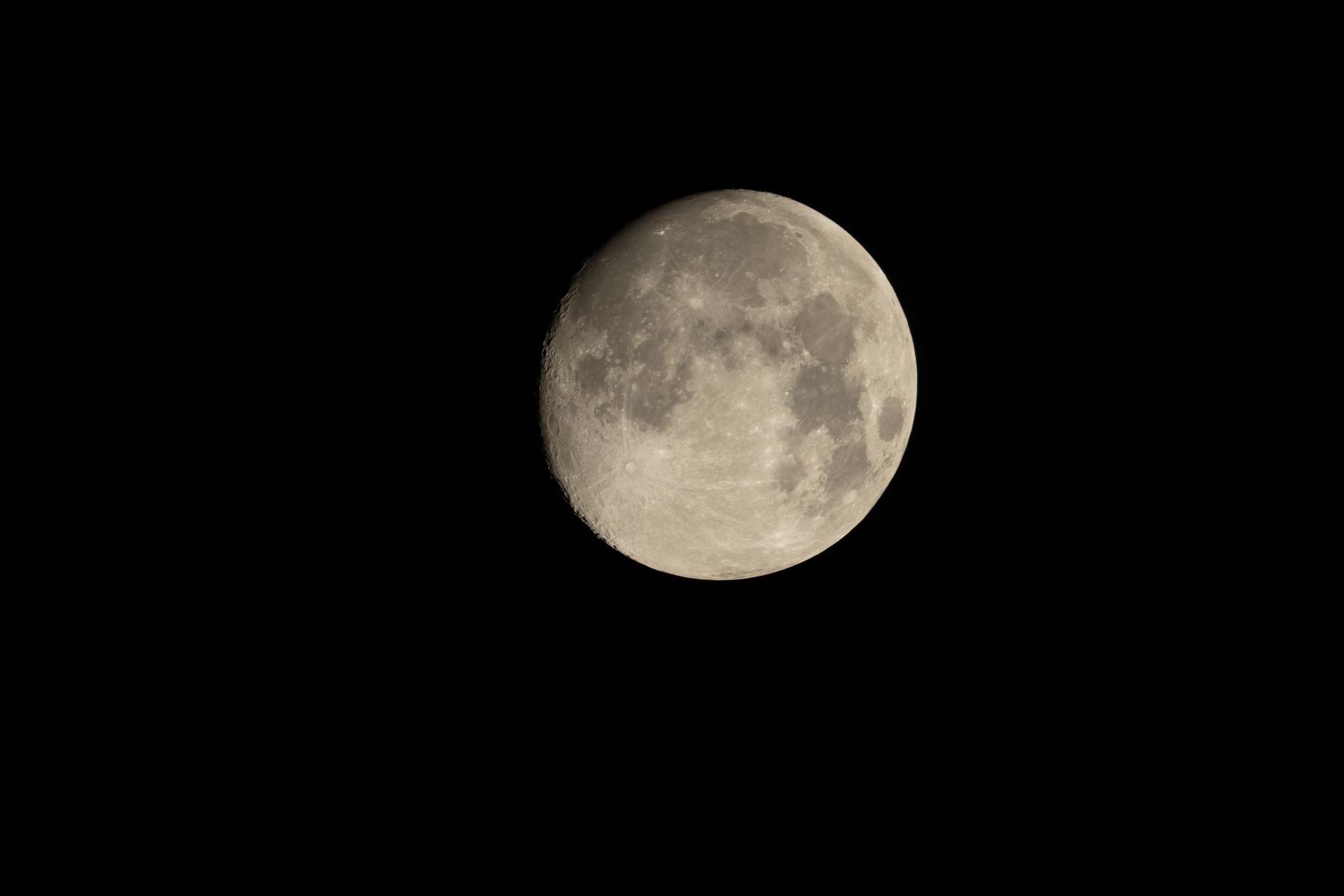 The Waxing Gibbous Moon is pictured on New Year's Day from the International Space Station as it orbited 266 miles above the North Pacific Ocean.