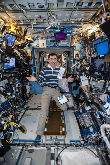 NASA image: JAXA astronaut Kimiya Yui appears to juggle research hardware