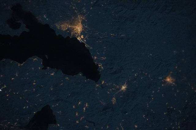 NASA image: The city lights of Erciş, Türkiye, and its suburbs and villages, surround Lake Van