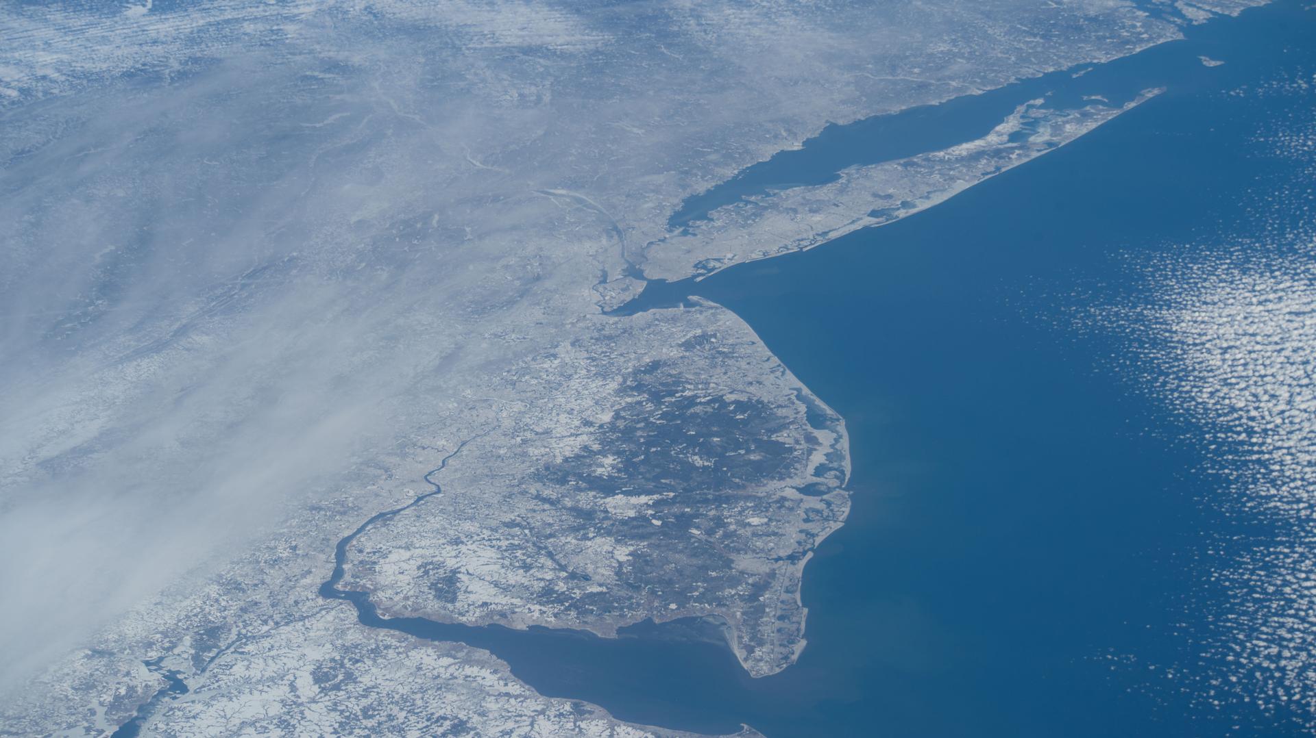 The wintry landscape from Delaware to Rhode Island is seen from the International Space Station as it orbited 259 miles above the Atlantic coast of the United States. Temperatures in New York City ranged from a low of about 14 degrees Fahrenheit to a high of around 23 degrees when this photograph was taken.