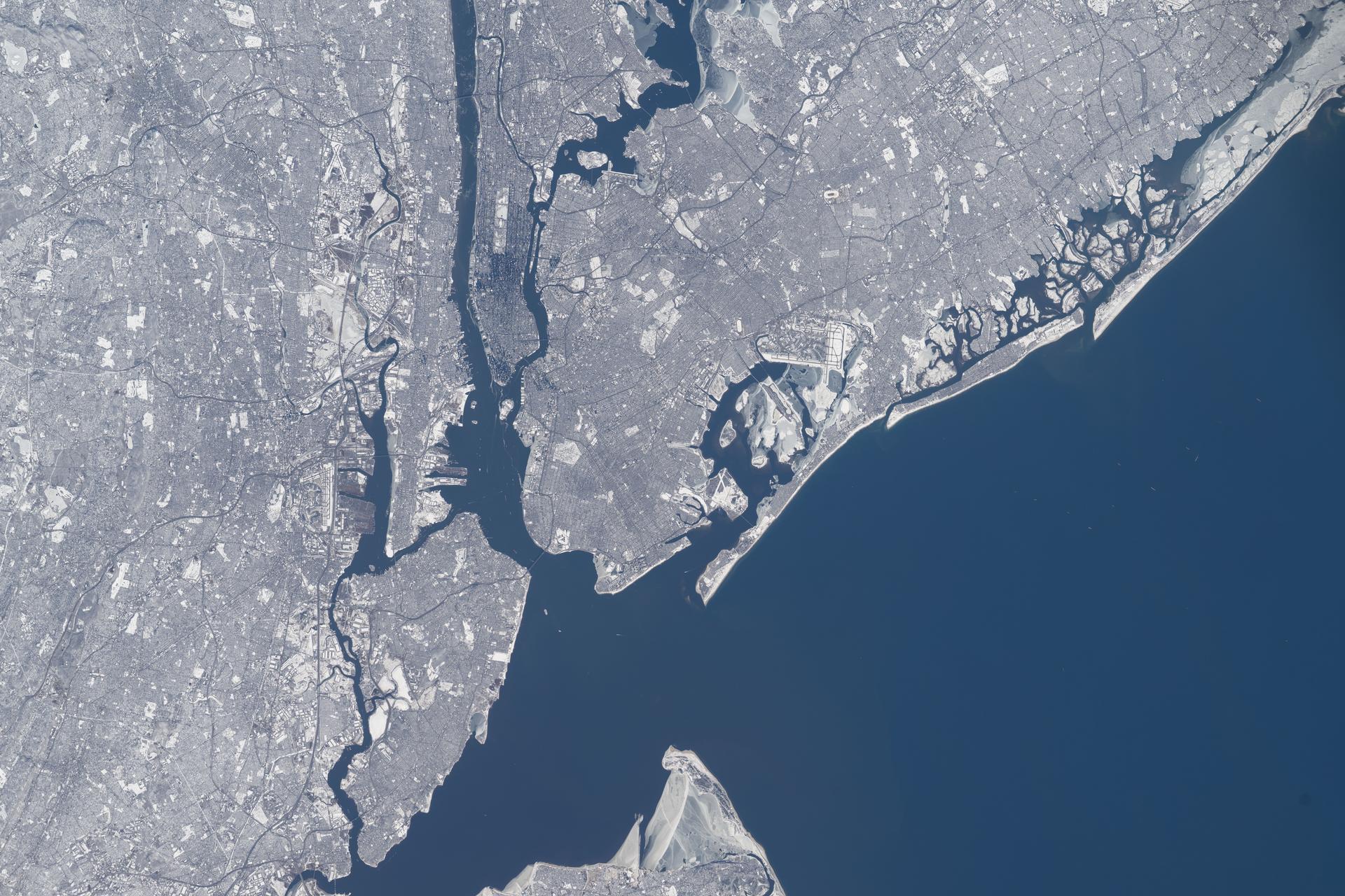 iss074e0315625 (Feb. 13, 2026) --- All five of New York City’s boroughs—Staten Island, Manhattan, Brooklyn, Queens, and the Bronx—are captured in this photograph of the wintry New York–Newark–Jersey City metropolitan area, which has a population of approximately 19.8 million. Near the center right is John F. Kennedy International Airport—America’s sixth-busiest airport, handling over 62 million passengers annually. Credit: NASA/Chris Williams