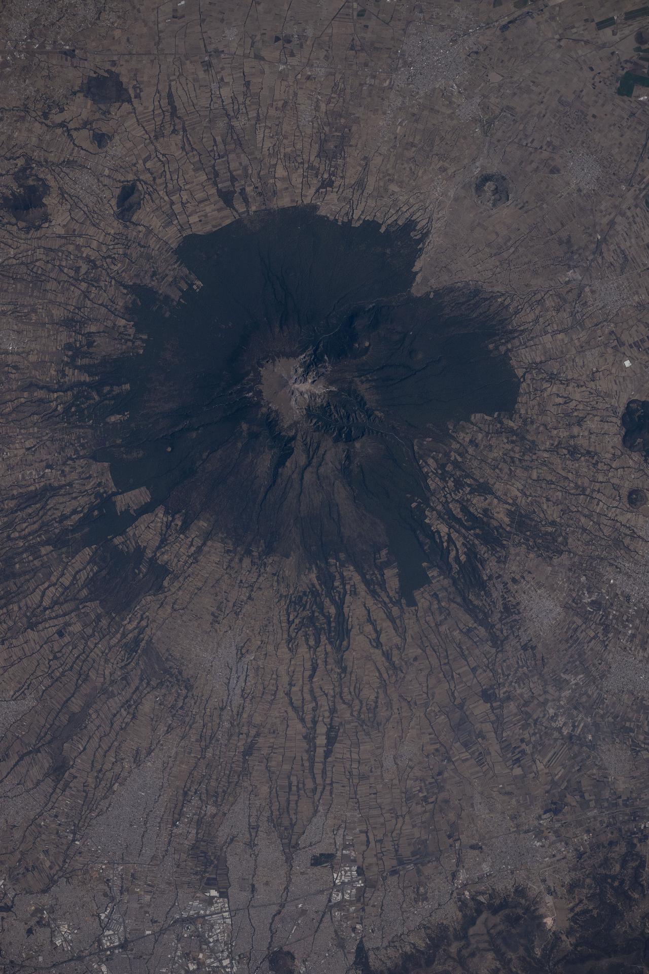 La Malinche Volcano, east of Mexico City, is a dormant, heavily eroded stratovolcano estimated to be about 30 to 35 million years old. The International Space Station was orbiting 259 miles above Oaxaca when this photograph was taken.