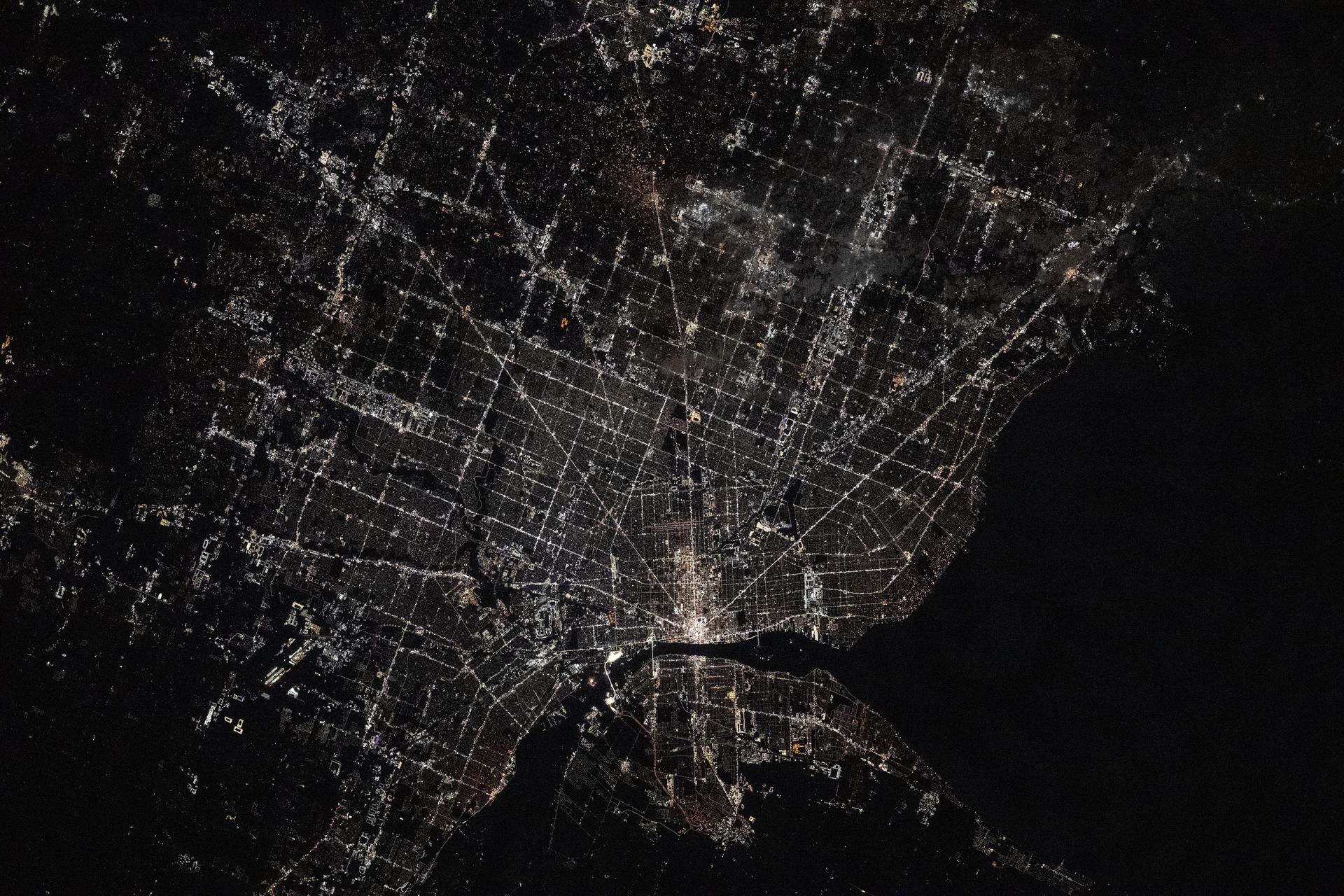 Detroit, Michigan—home to America’s automotive pioneers and with a history of more than 300 years—sits on the Detroit River across from Windsor, Ontario, Canada. The International Space Station was orbiting 264 miles above North America at approximately 1:18 a.m. local time when this photograph was taken.