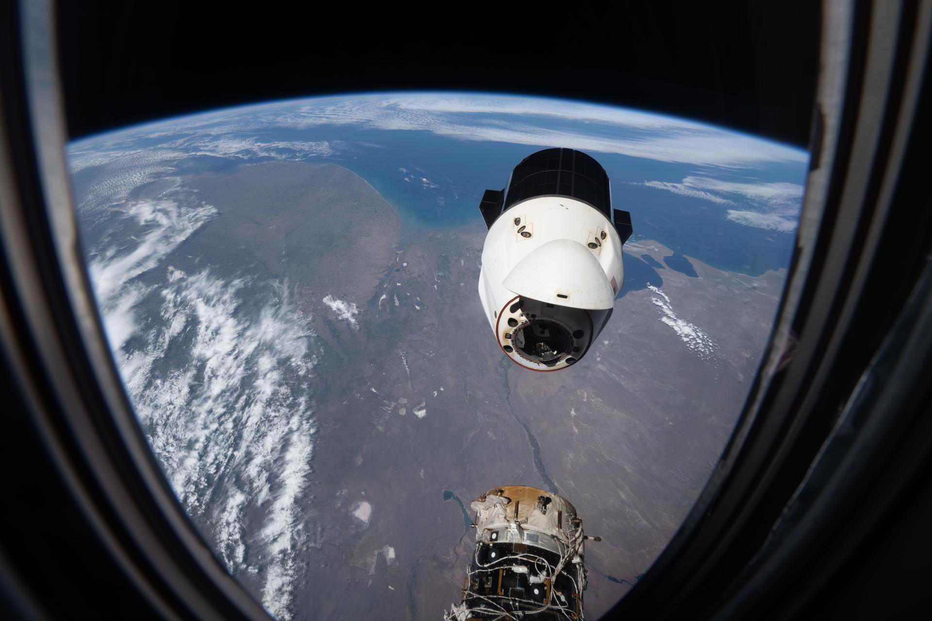 A SpaceX Dragon spacecraft, packed with several tons of science experiments and lab hardware, backs away from the Harmony module’s forward port shortly after undocking from the International Space Station. The orbital outpost was soaring 271 miles above Argentina’s Atlantic coast at the time of this photograph. Dragon splashed down several hours later in the Pacific Ocean off the coast of San Diego, California, where it was retrieved by NASA and SpaceX personnel.