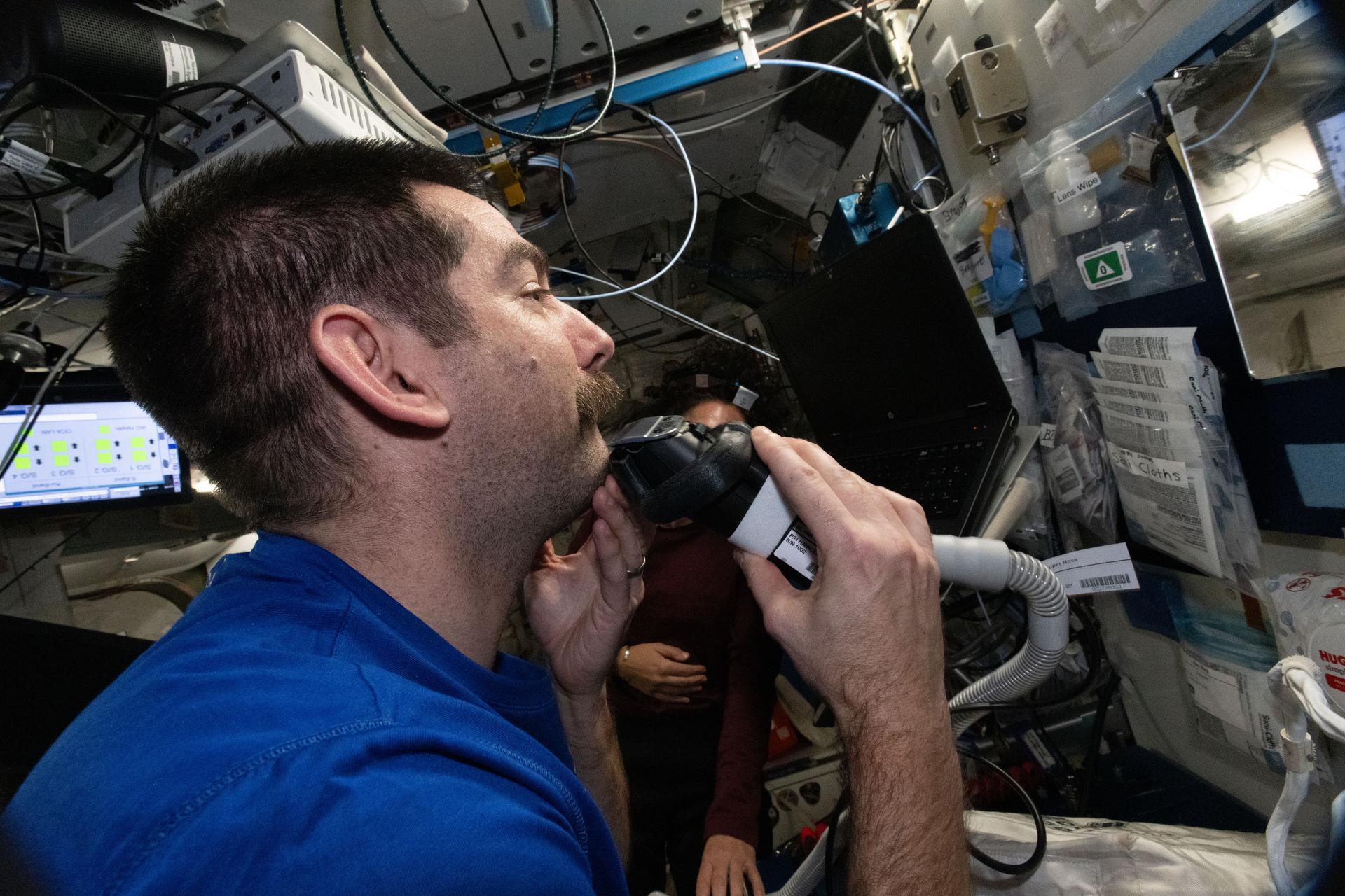 NASA astronaut and Expedition 74 flight engineer Jack Hathaway gives himself a shave and trims his mustache using an electric razor attached to a vacuum that collects loose clippings to keep the station’s atmosphere clean in microgravity.
